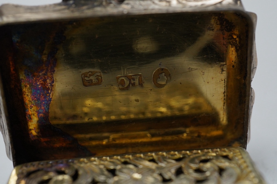 A late George III silver rectangular vinaigrette, John Thropp, Birmingham, 1819, 39mm and one other foliate scroll engraved silver vinaigrette, Birmingham, 1845. Condition - poor to fair